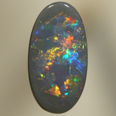 SOLID SEMI BLACK OPAL Sparkling red, orange and green move brightly
